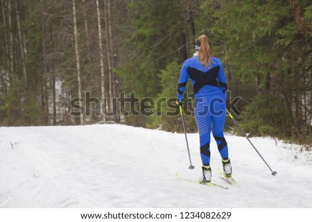 Girl skiing in winter