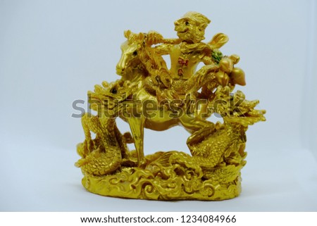 Gold dragon monkey and horse statue on white background