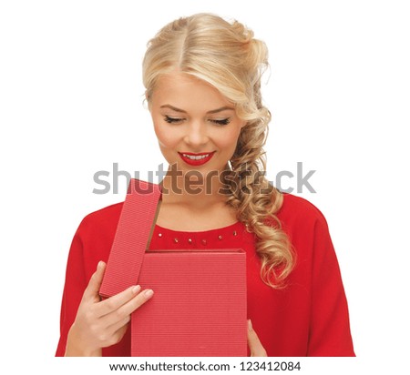 picture of lovely woman in red dress with opened gift box