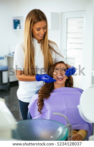 Young woman at dentis't office
