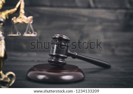 Law and Justice, Legality concept, Judge Gavel, Scalesof Justice and Lady Justice on a black wooden background.