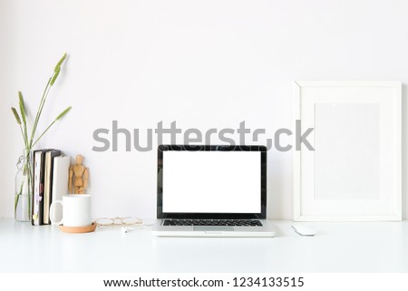 workspace desk and laptop. copy space and blank screen. Business image, Blank screen laptop and supplies. Royalty-Free Stock Photo #1234133515