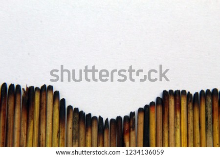 Abstract art, burned bamboo sticks texture with white background with copy space for text or word. wallpaper. yellow pattern, soft focus,shallow DOF