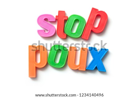 closeup of colorful plastic letters on white background - Stop Poux in french text, traduction in english : Stop Lice