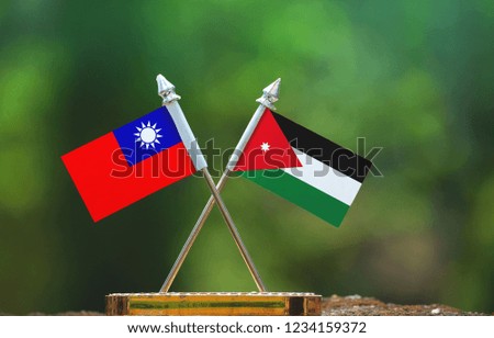 Jordan and Taiwan small flag with blur green background