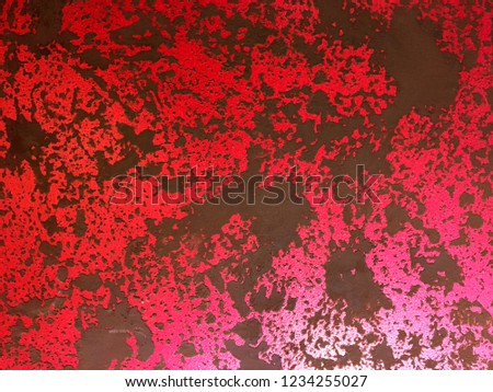 red wall with black spots