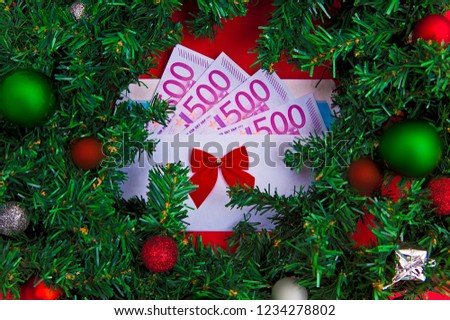 Euro in an envelope on a gift