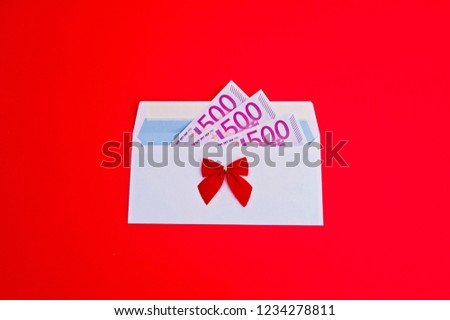 Euro in an envelope on a gift