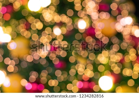 de focused glittering lights of Christmas Tree Bokeh background