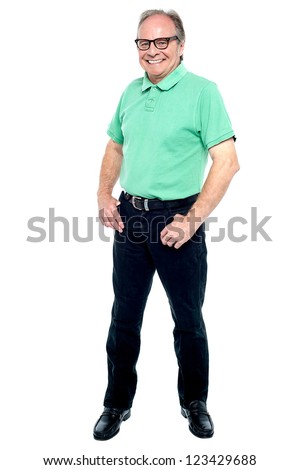 Handsome senior male citizen posing in style over white background.