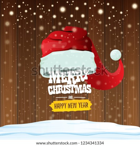 vector red Santa hat with greeting text Merry Christmas and happy new year on wooden background with falling snowflakes. Funny Merry christmas greeting card, banner or poster xmas background.