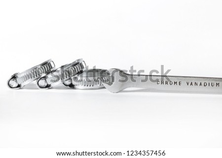 Safety clamp stainless on white background close-up, isolated