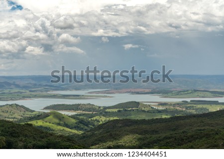 Landscape of mountains with dammed lake in the region of Minas Gerais State, Brazil
