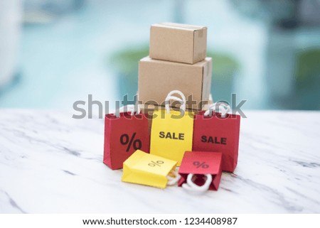 Holidays and sale shopping concept -  many paper bag with percent sign