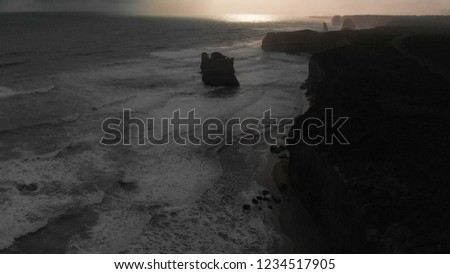 Panoramic aerial view of Twelve Apostles from Gibson Steps on a stormy sunset, Australia.