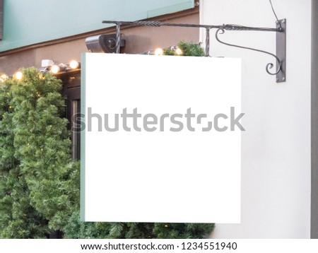 Mock up. Empty signboard of christmas decorated store, restaurant, cafe, outdoors
