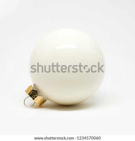 Single white Christmas tree ball isolated on a white background