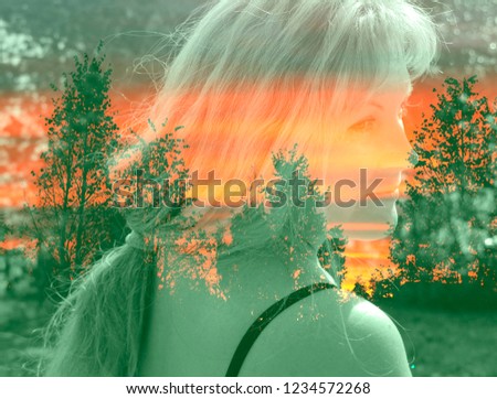 a beautiful woman in a double exposure image looks thoughtfully into the distance