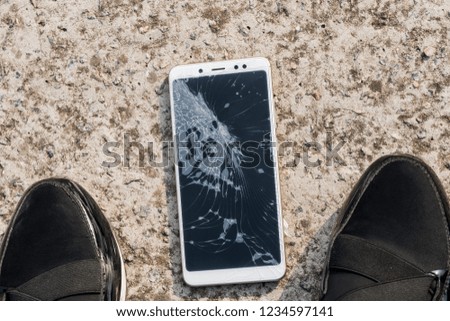 Smartphone with a broken screen. broken phone Close-up.