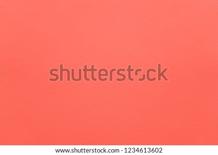 Color of the year 2019: Living Coral. Fashionable pantone trendy color of spring-summer 2019 season. Texture of colored paper for watercolor and pastel. Modern background or mock up with copy space Royalty-Free Stock Photo #1234613602