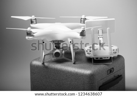 Flying drones on black background. Theme selling and buying drone 