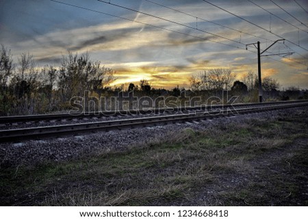 Sunset over the railroad. Filmed in hdr.