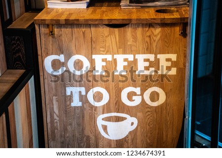 Organic coffee signage at a cafe. Coffee to go interior concept