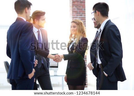 handshake of two business women in the office