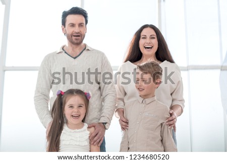 portrait of a happy family with small children