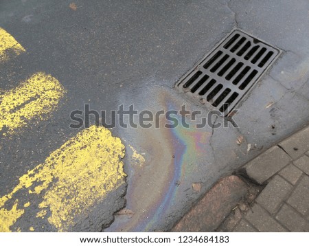 industrial puddle with oil hazard water