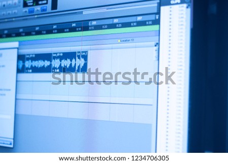 Recording studio audio computer editing mixing program sound controls for music and voice production.