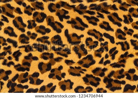 Vintage leopard background. Faux animal fur texture.