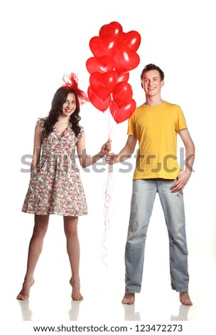 lovers with red balloons hearts