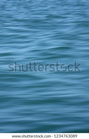 The motion of the waves provides an abstract backdrop in this close up picture of the sea. UK
