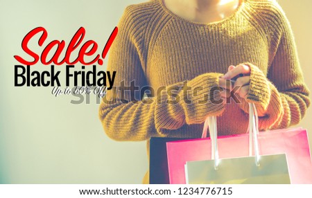 Black Friday sale, Happy girl hold shopping bag
