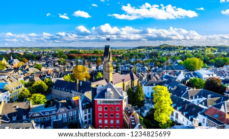 Aerial view of the historic city of Maastricht in the Netherlands as seen from the tower of the Sint Janskerk (St.John Church) which is at the Vrijthof square in the center of the city Royalty-Free Stock Photo #1234825699