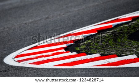 sleek asphalt on the corner of the motorbike track, MotoGP race.
