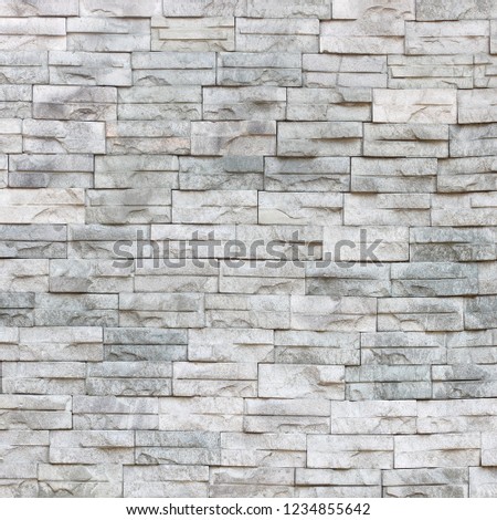 Gray slate wall stone background or texture.