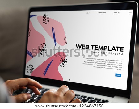 Working on a web template on the laptop Royalty-Free Stock Photo #1234867150