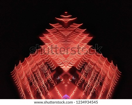 Multicolor Abstract lights in motion for Christmas and New Year celebrations. Abstract background of Red, Yellow, Blue and white color. 