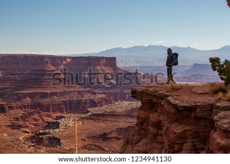 Hiker in Canyonlands National park in Utah, USA Royalty-Free Stock Photo #1234941130