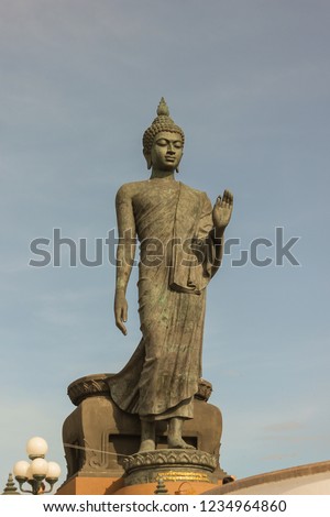 Standing Buddha statue at Phutthamonthon park, Nakhon Pathom Province of Thailand