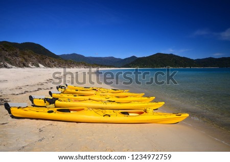 Sea kayaks on a beach