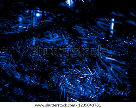Dark blue christmas tree - holiday christmas card. Background and Texture