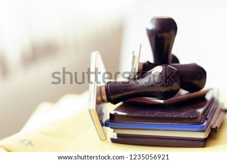 Rubber Stamps on office desk.