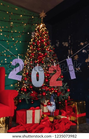 2021 numbers new year party, christmas tree at home
