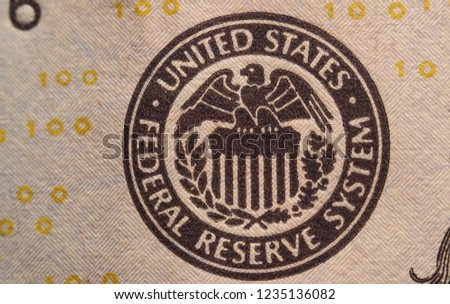 Image of a stamp of the US Federal Reserve on a one hundred dollar bill. Dollar. Money.  Dollar stamp.                        