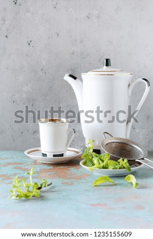 coffee set with fresh mint on gray background. Tasty drinks