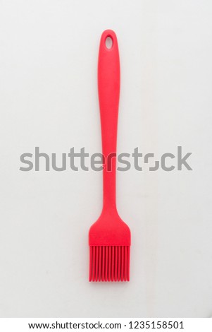 Red silicone brush