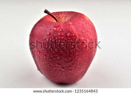 fresh red apple with water drops isolated on white background with clipping path